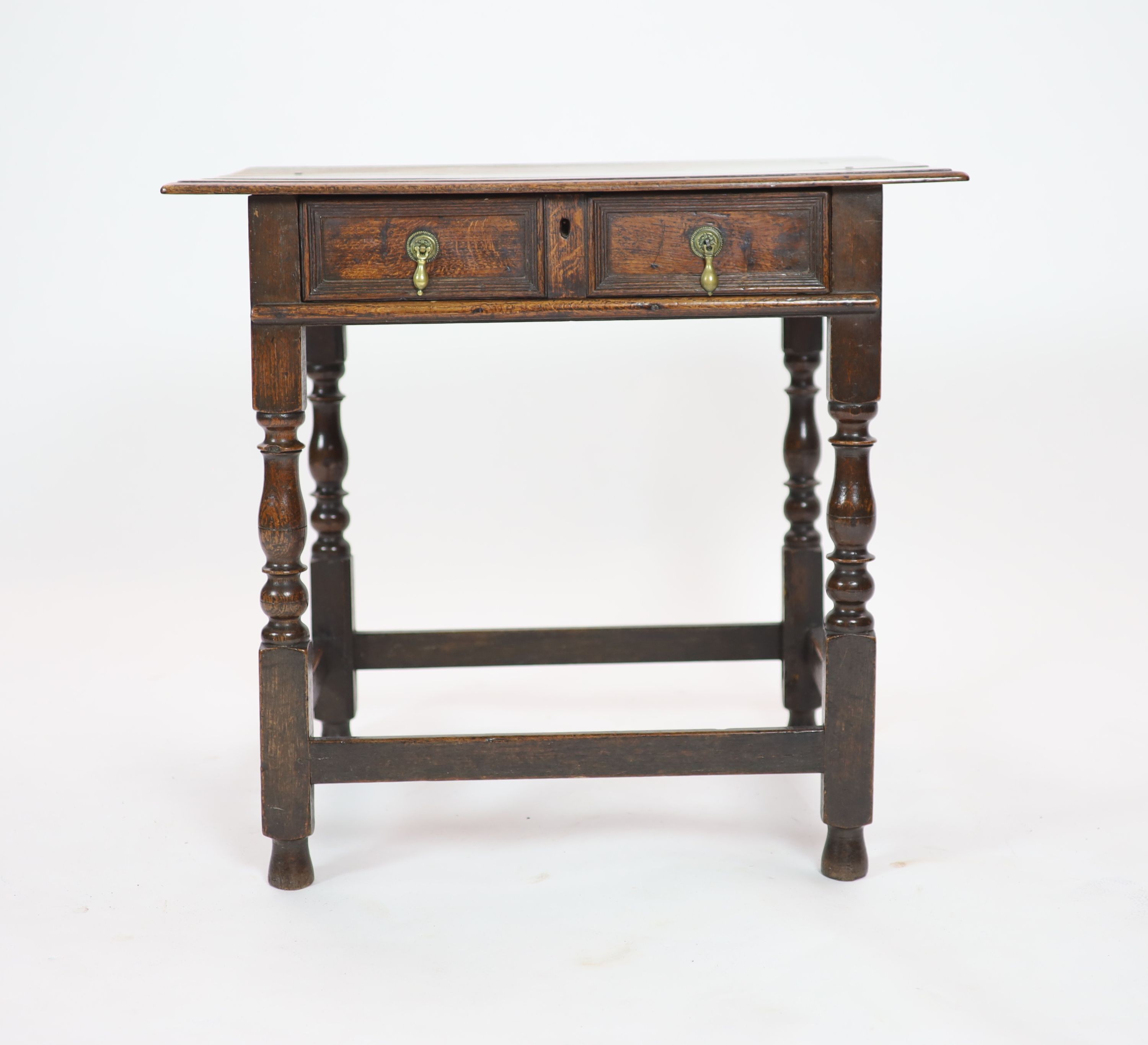 A William and Mary rectangular oak side table H 70cm. W 77cm. D 54cm.